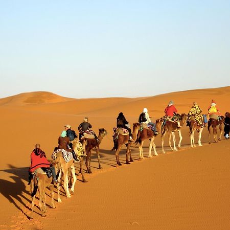 Отель Sahara Camel Tours Camp Мерзуга Экстерьер фото