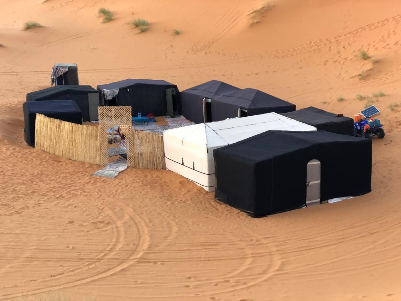 Отель Sahara Camel Tours Camp Мерзуга Экстерьер фото
